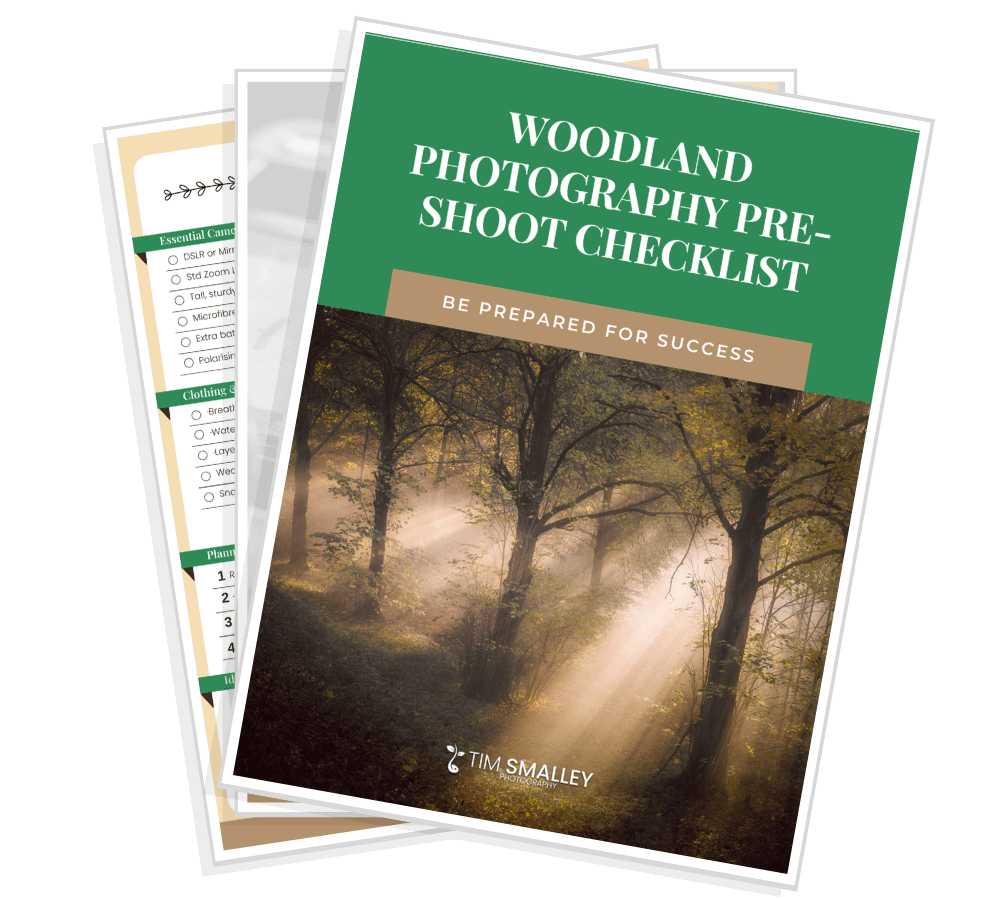 Pre-shoot Checklist Lead Magnet Mockups - Square A stack of papers displays a cover titled Woodland Photography Pre-Shoot Checklist, featuring a tranquil forest scene. Sunlight filters through the trees, casting a gentle light on the ground. Below, it reads Be Prepared for Success and by Tim Smalley. Behind are pages containing checklists and notes.