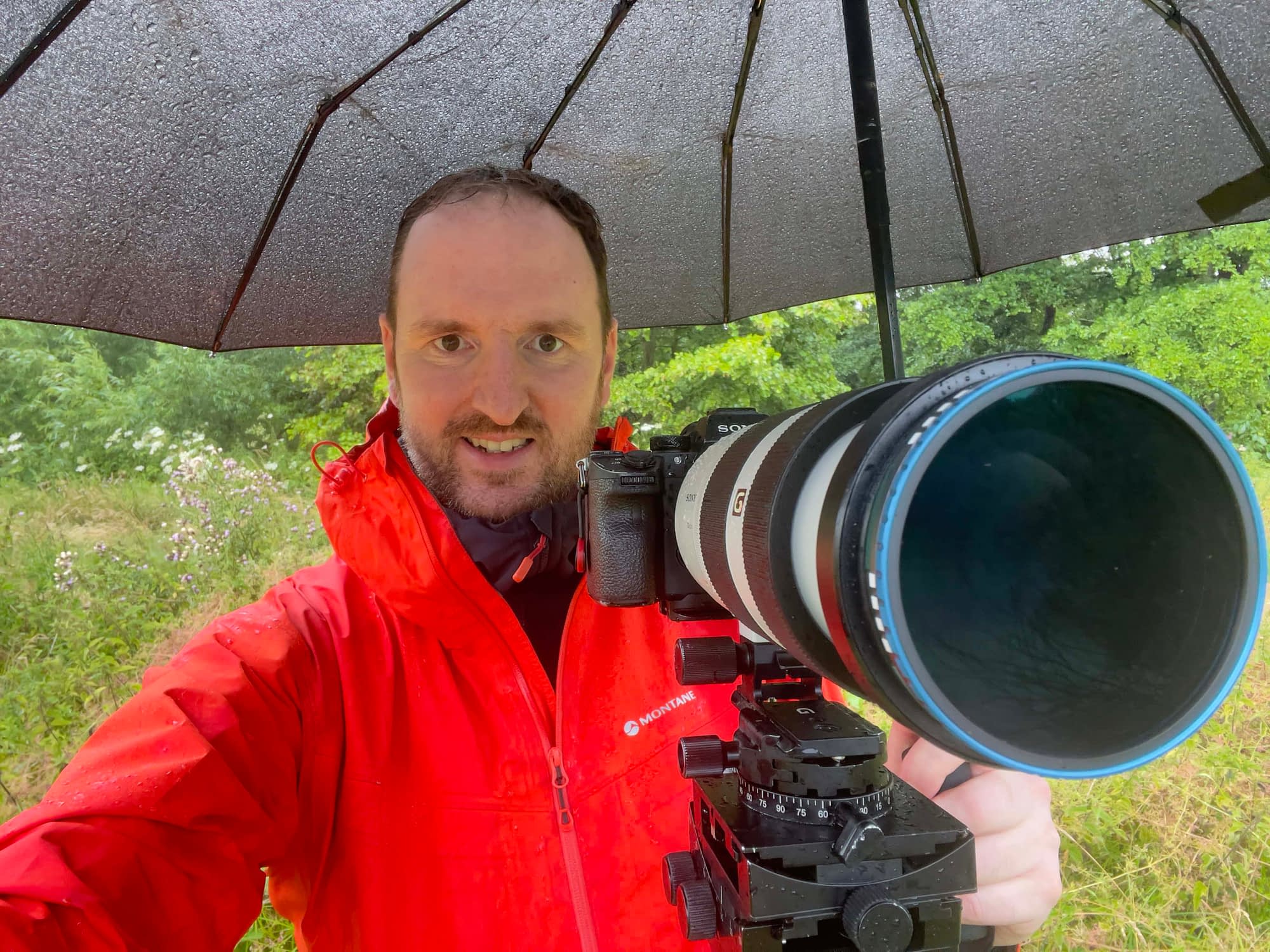 Tim Smalley A photograph of woodland photographer Tim Smalley out in the woods on a rainy day.